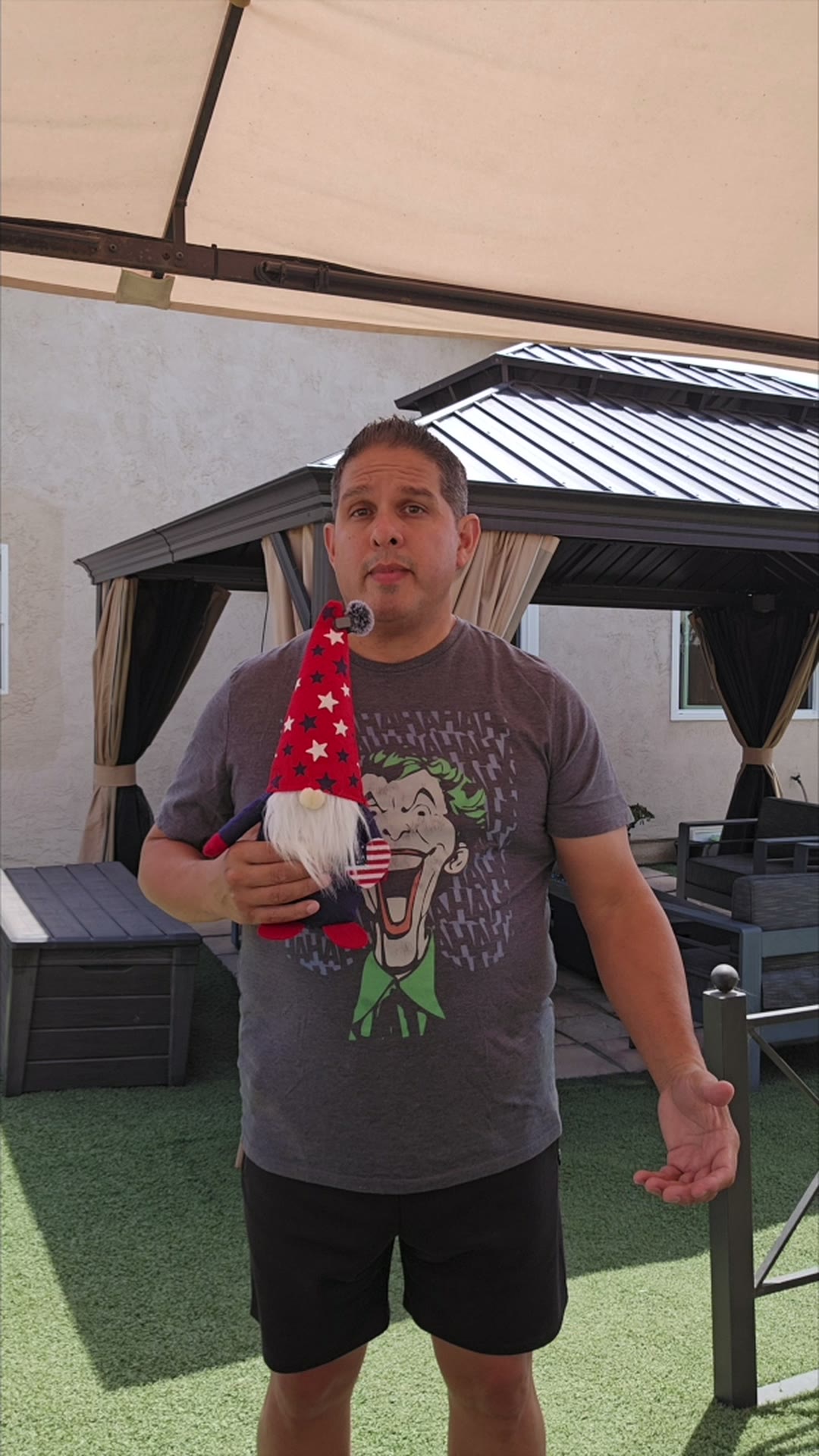 John on day 15 of the 90 day water fast, under the backyard gazebo with the gnome