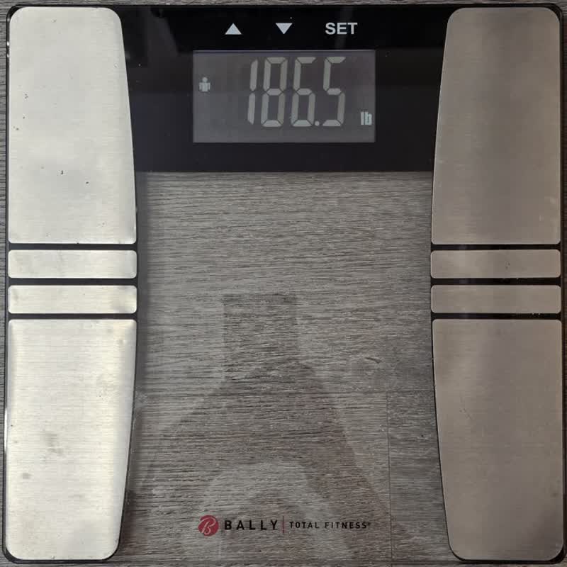 Scale photo from the morning of day 56 reading 186.5 pounds
