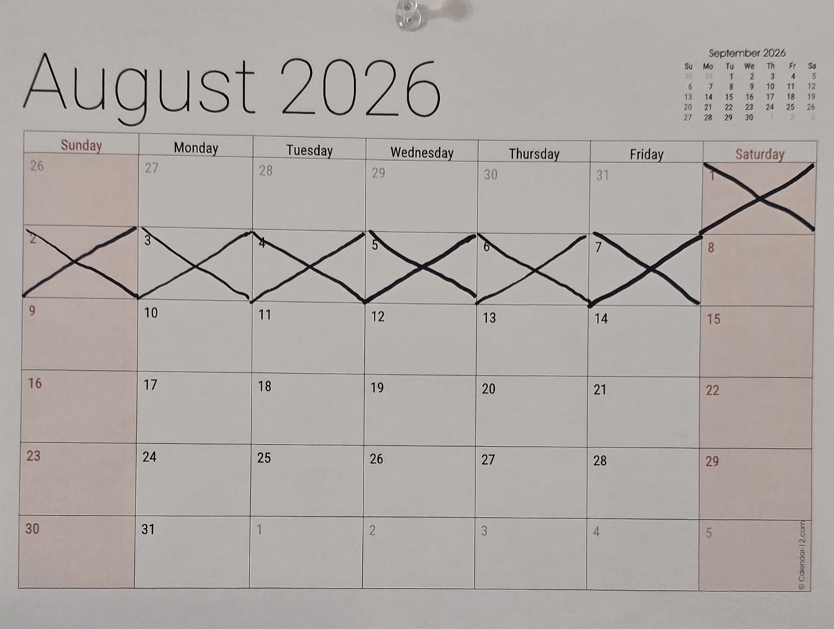 The August 2026 wall calendar with the first week of the fast crossed off